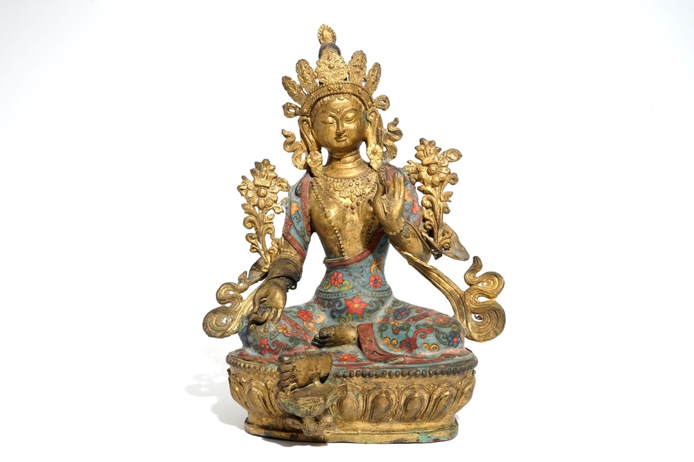 A large Chinese gilt bronze and cloisonn&eacute; figure of Green Tara, 19th C.