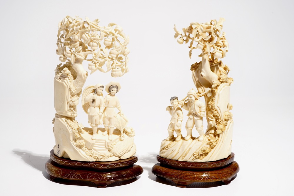 Two Chinese carved ivory groups on wooden base, 2nd quarter 20th C.