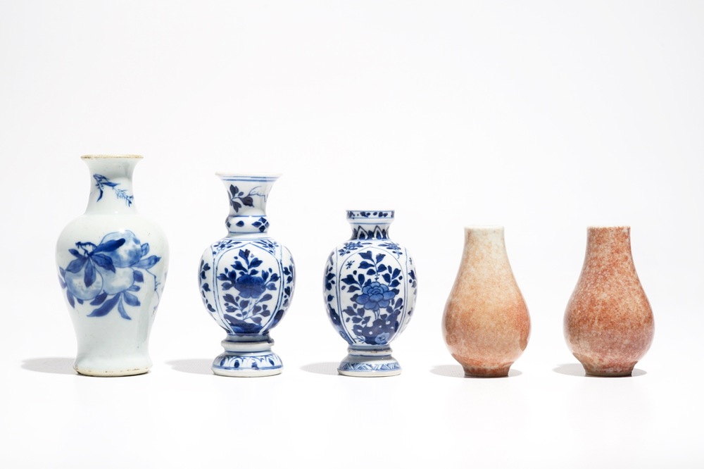 Five Chinese blue and white and copper red miniature vases, Kangxi