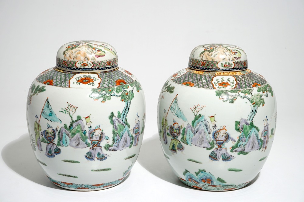 A pair of Chinese famille verte covered jars with figural design, 19th C.