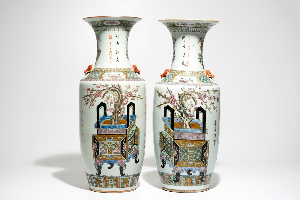 A pair of tall Chinese famille rose vases with incense burners, 19th C.