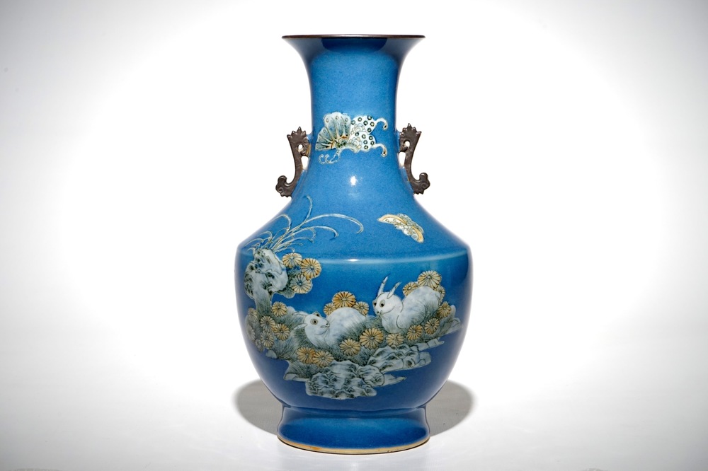 A Chinese blue ground-vase with rabbits and butterflies, 19th C.