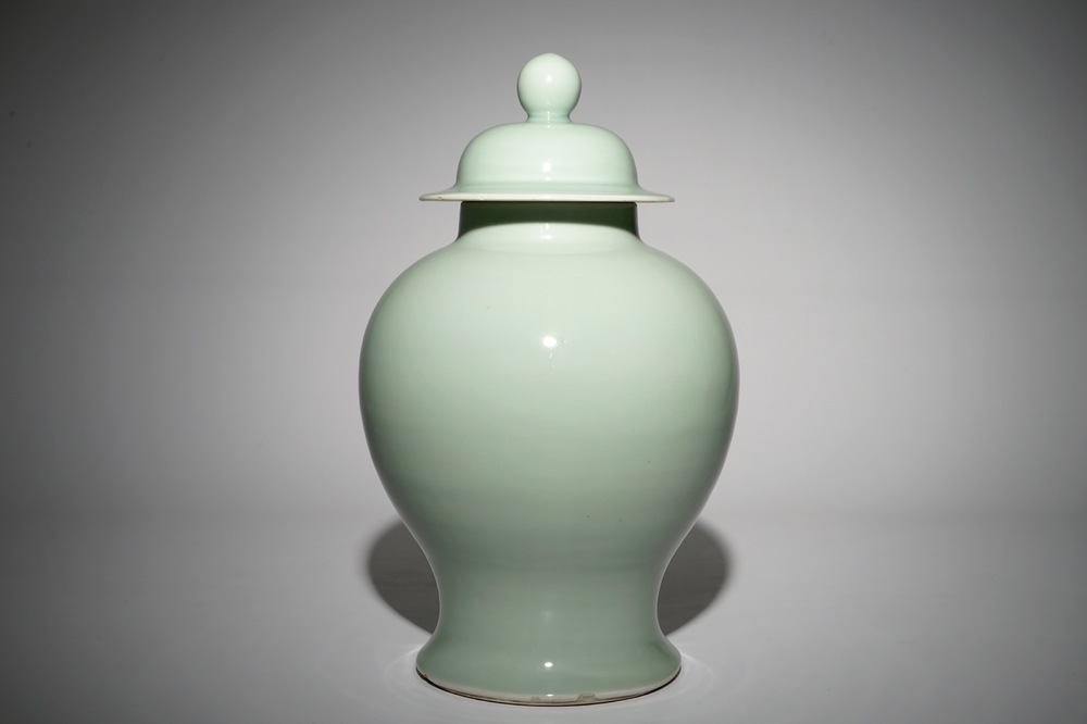 A Chinese monochrome celadon baluster vase and cover, 19th C.