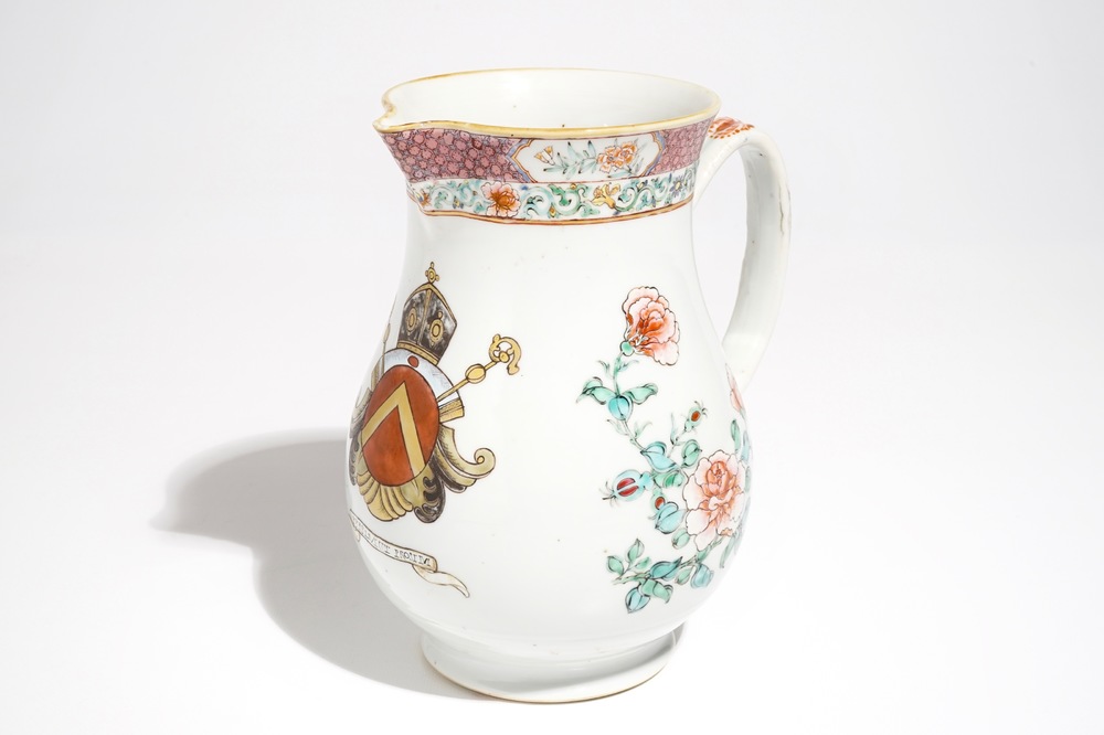 A large Chinese famille rose armorial jug with floral design, Yongzheng