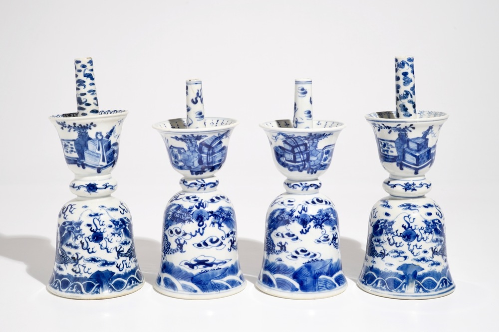 Two pairs of Chinese blue and white candlesticks with dragons, 19/20th C.