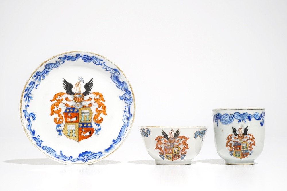Two Chinese armorial cups and a saucer for the Belgian market, Qianlong