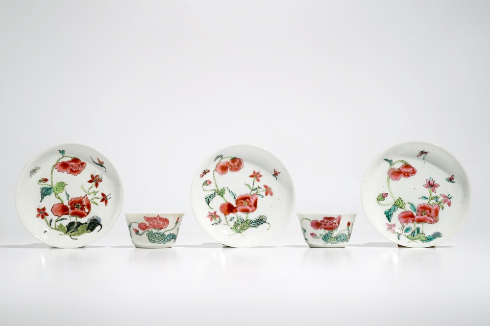 Two Chinese famille rose cups and three saucers with floral design, Yongzheng/Qianlong