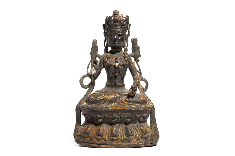 A Chinese laquered bronze figure of Guanyin, Ming