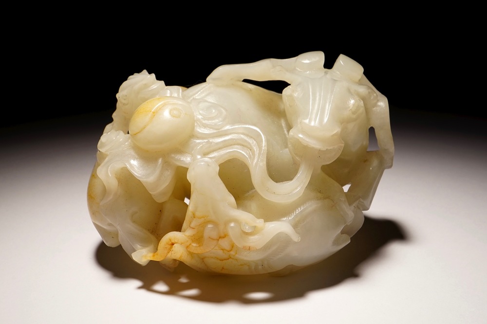 A Chinese white jade carving of a "Three rams" group, 19/20th C.