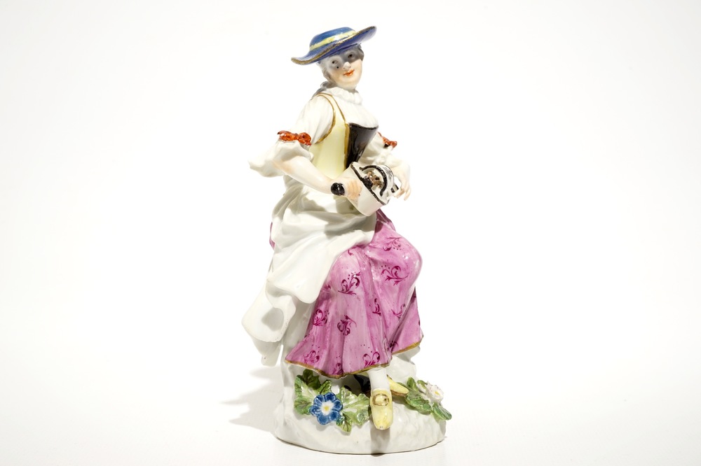 A Meissen porcelain Commedia del'Arte figure of Colombine playing a hurdy-gurdy, Germany, 18th C.