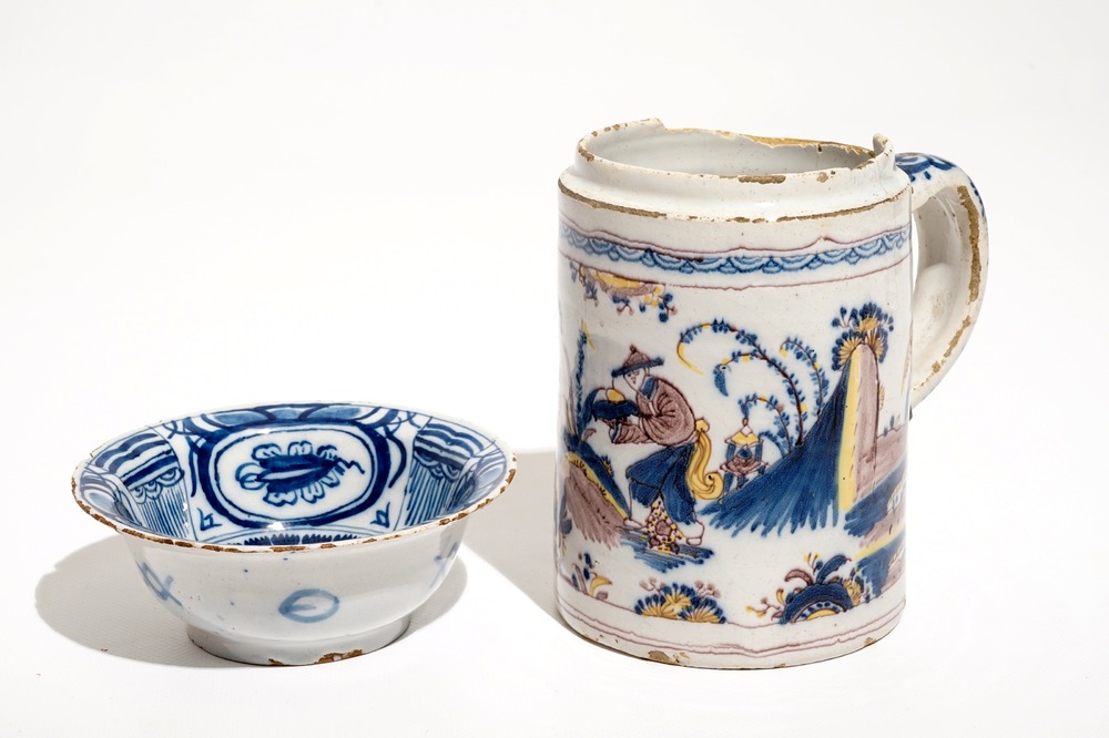 A Dutch Delft blue and white chinoiserie bowl and a polychrome Braunschweig mug, 1st half 18th C.