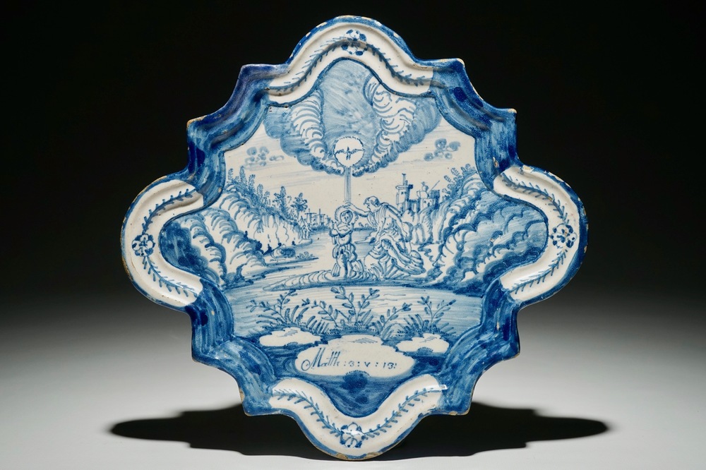 A Dutch Delftware blue and white biblical plaque with "The Baptism of Christ", Amsterdam, dated 1767