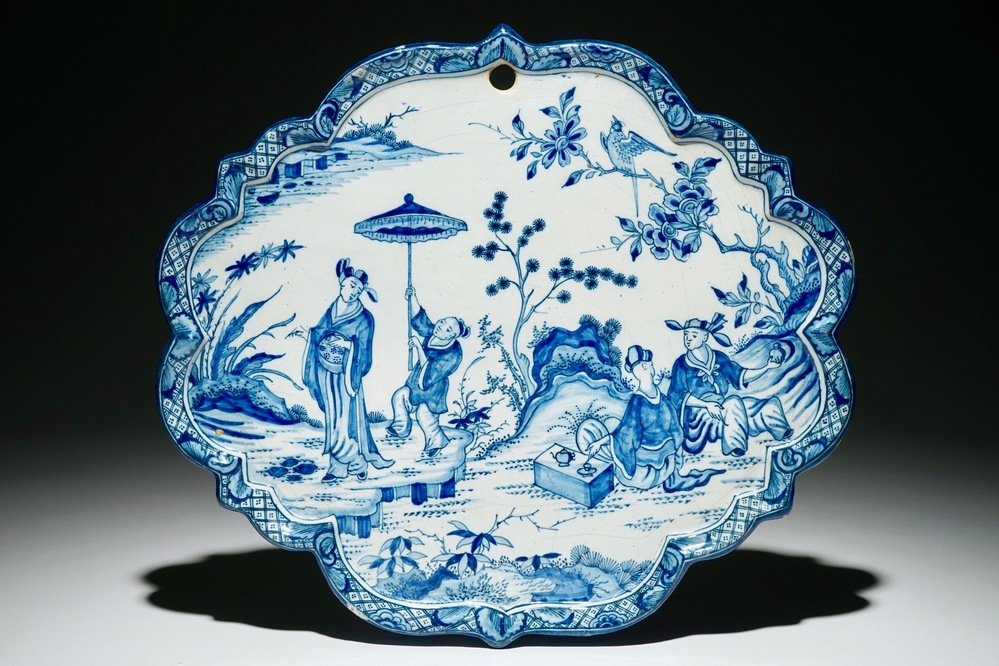 A fine Dutch Delft blue and white chinoiserie tea scene plaque, 1st half 18th C.