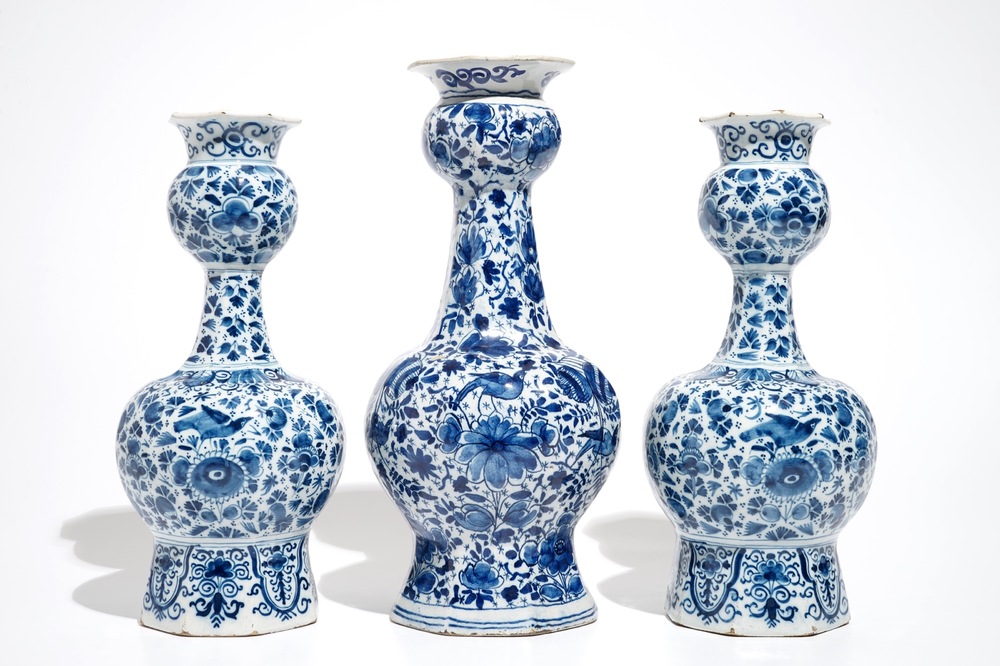 Three Dutch Delft blue and white garlic neck vases with birds on millefiori design, 18th C.
