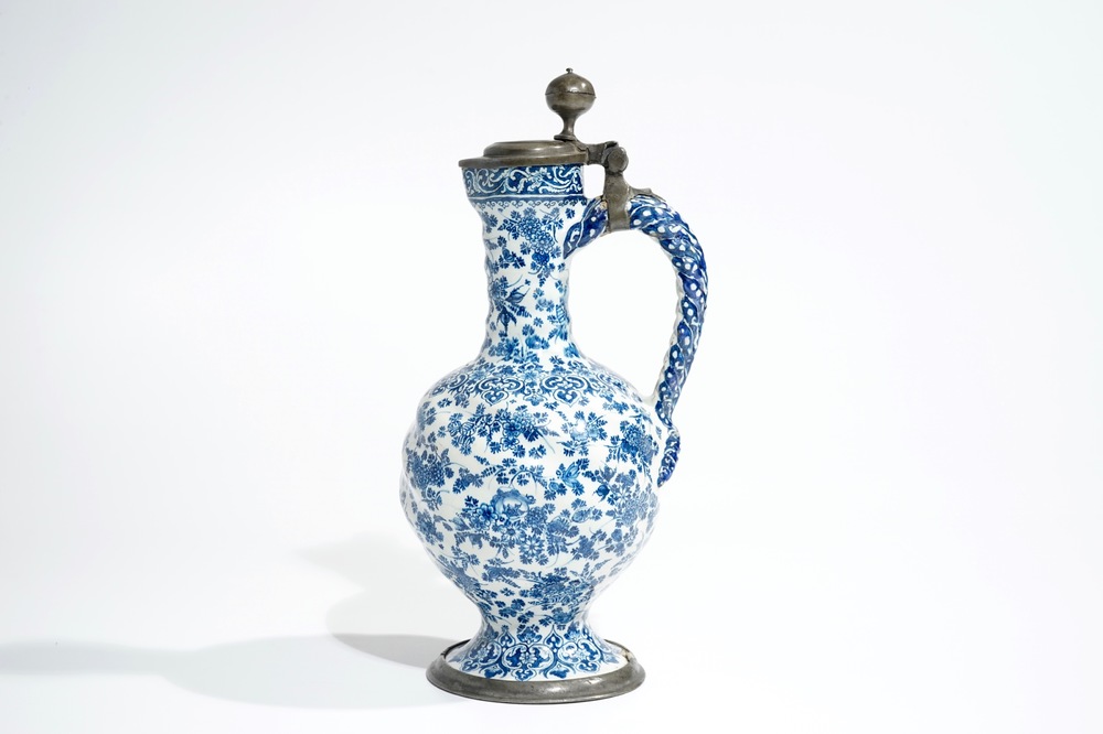 An attractive Dutch Delft blue and white gadrooned pewter-mounted jug, 2nd half 17th C.