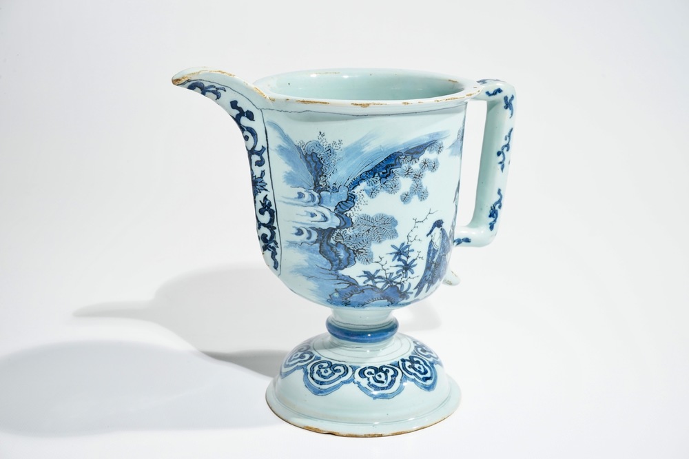 A Dutch Delft blue and white helmet-shaped ewer, 2nd half 17th C.