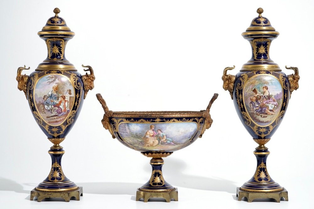 A three piece bronze-mounted Sevres porcelain garniture, 19th C.