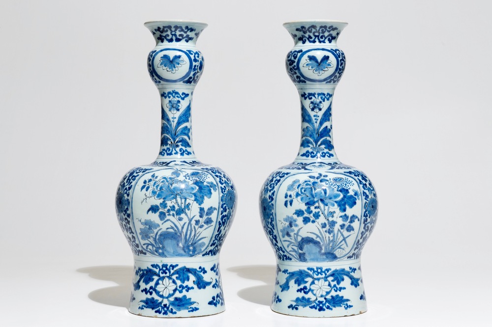 A pair of tall Dutch Delft blue and white chinoiserie vases, 1st half 18th C.