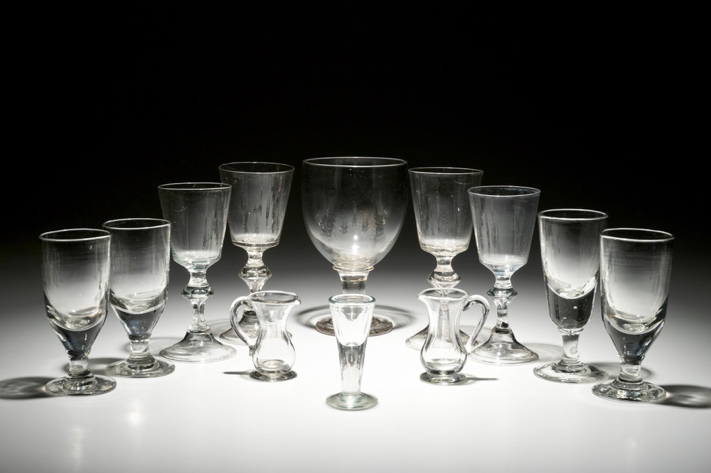 Ten stemmed glasses and two small glass jugs, England, 18/19th C.