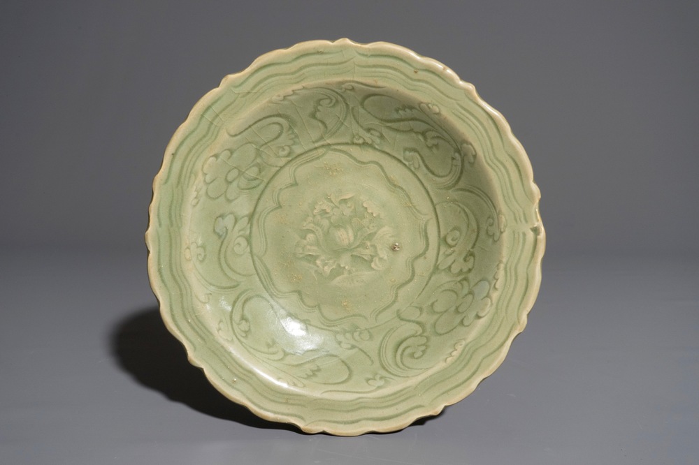 A Chinese Longquan celadon incised "Peony" dish, early Ming