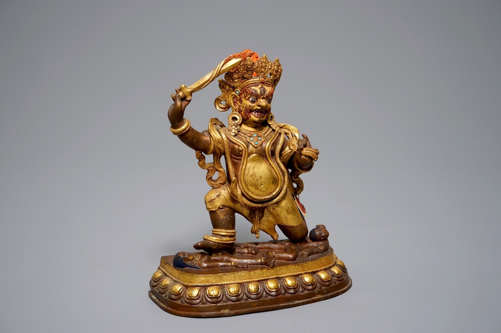 A Sino-Tibetan gilt bronze figure of Mahakala, 19th C.