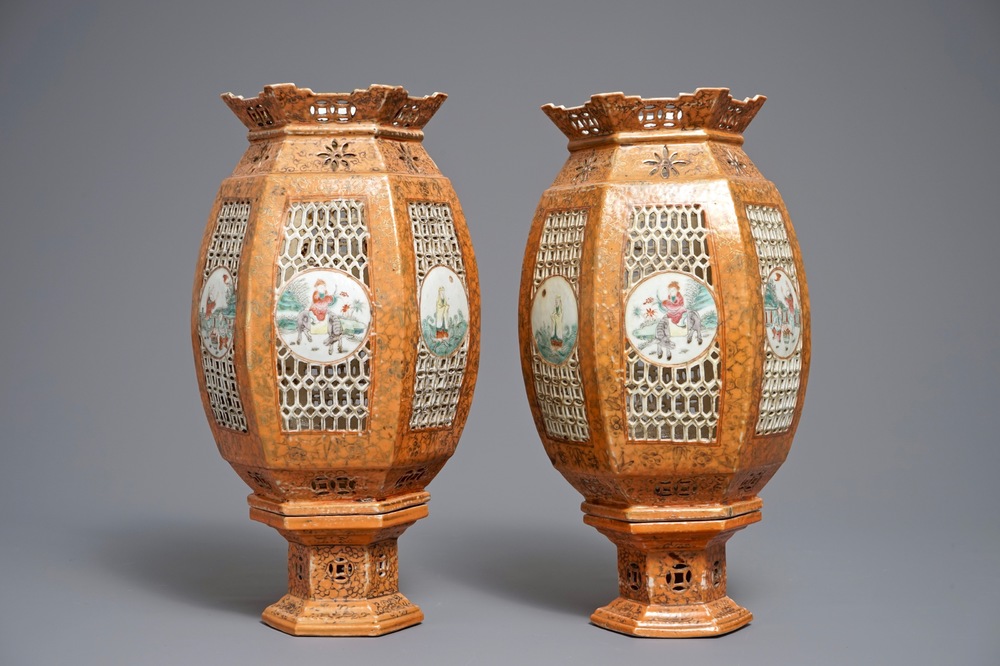 A pair of Chinese famille rose coral-ground lanterns, 19/20th C.
