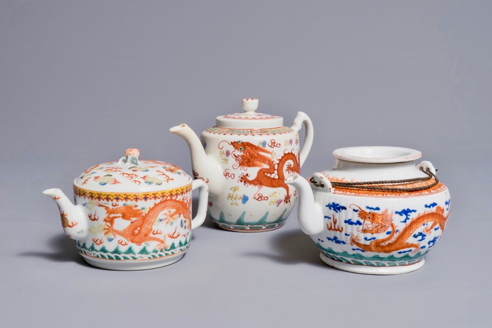 Three Chinese teapots and covers with dragon designs, 19/20th C.