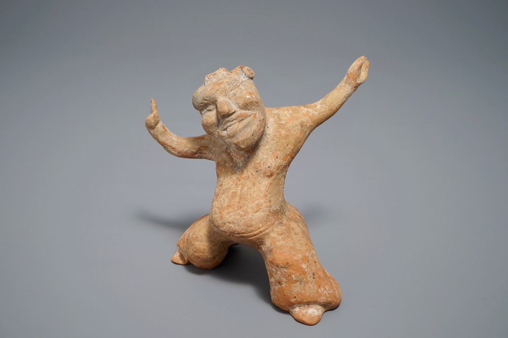 A Chinese pottery figure of a male dancer, Han