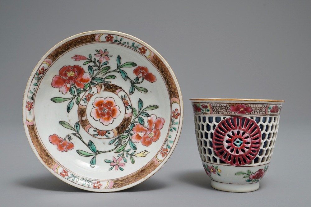 A reticulated double-walled Chinese famille rose cup and saucer, Yongzheng
