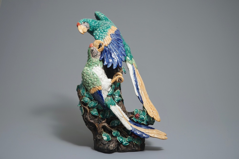 A large Chinese Shiwan pottery group of parrots, impressed mark, 20th C.