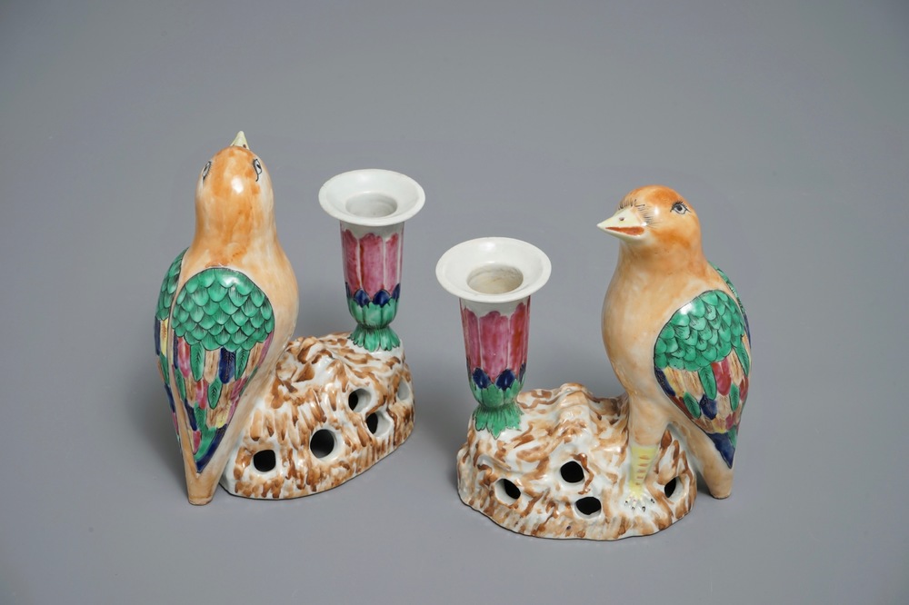 A pair of Chinese famille rose candle holders shaped as birds on a rock, Jiaqing