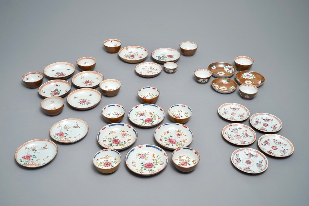 A collection of 15 Chinese famille rose capucin-ground cups and 21 saucers, Qianlong