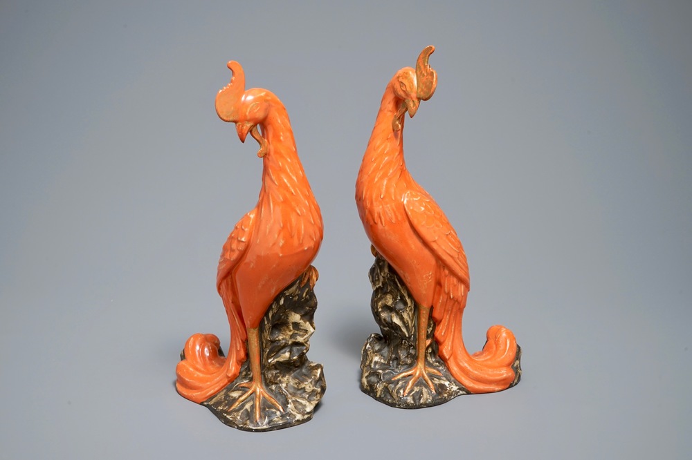A pair of Chinese coral-ground models of phoenixes, 19/20th C.