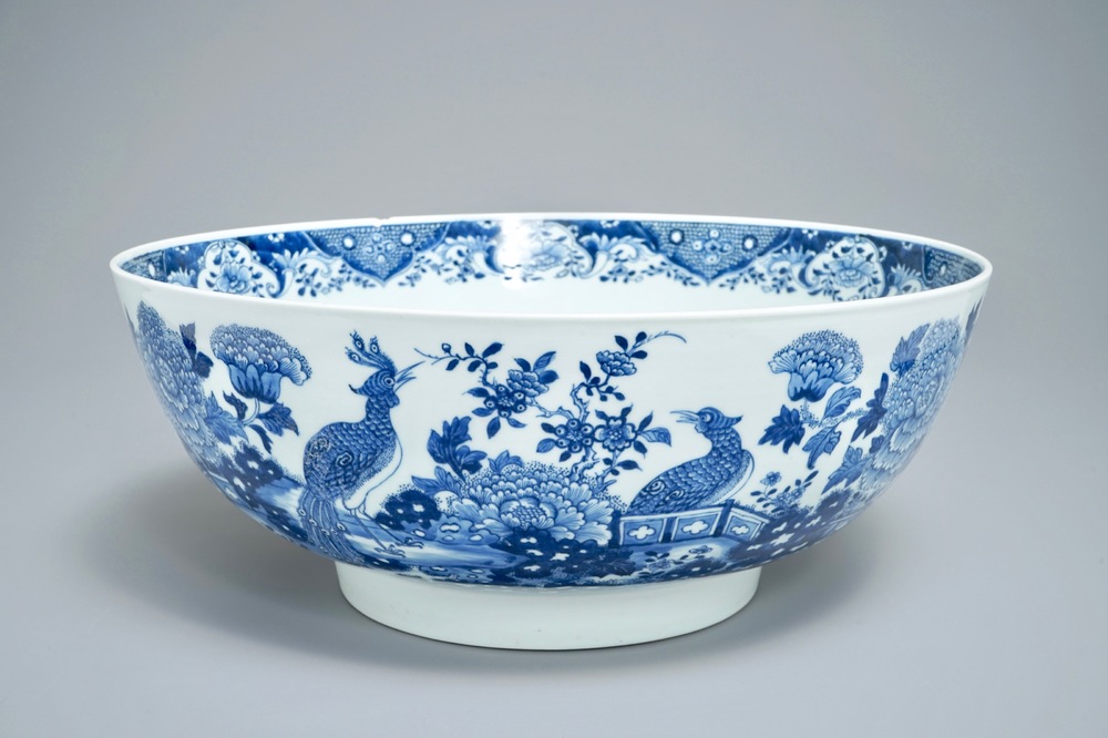 A large Chinese blue and white bowl with birds among blossoming flowers, Qianlong
