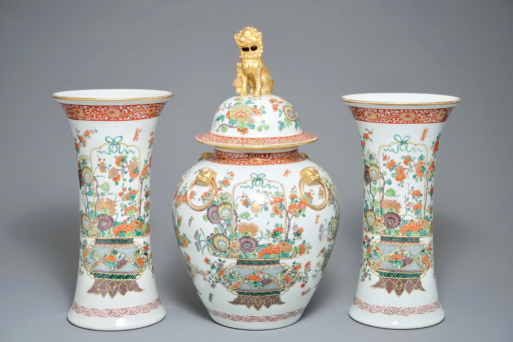 A famille verte-style three-piece garniture with fine flower baskets, Samson, Paris, 19th C.