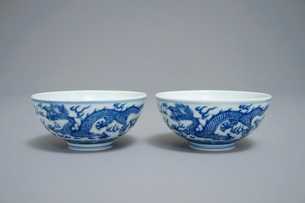 A pair of Chinese blue and white 'dragon' bowls, Guangxu mark, 19/20th C.