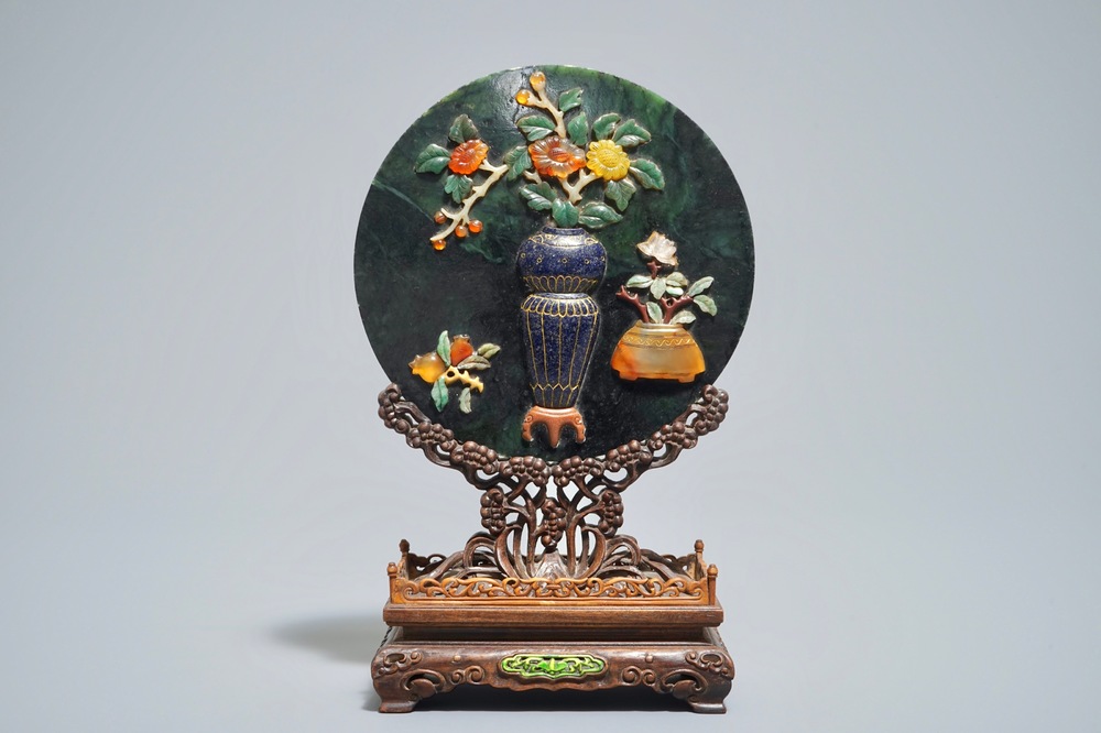 A Chinese spinach jade and hardstone inlaid screen on wooden stand, 20th C.