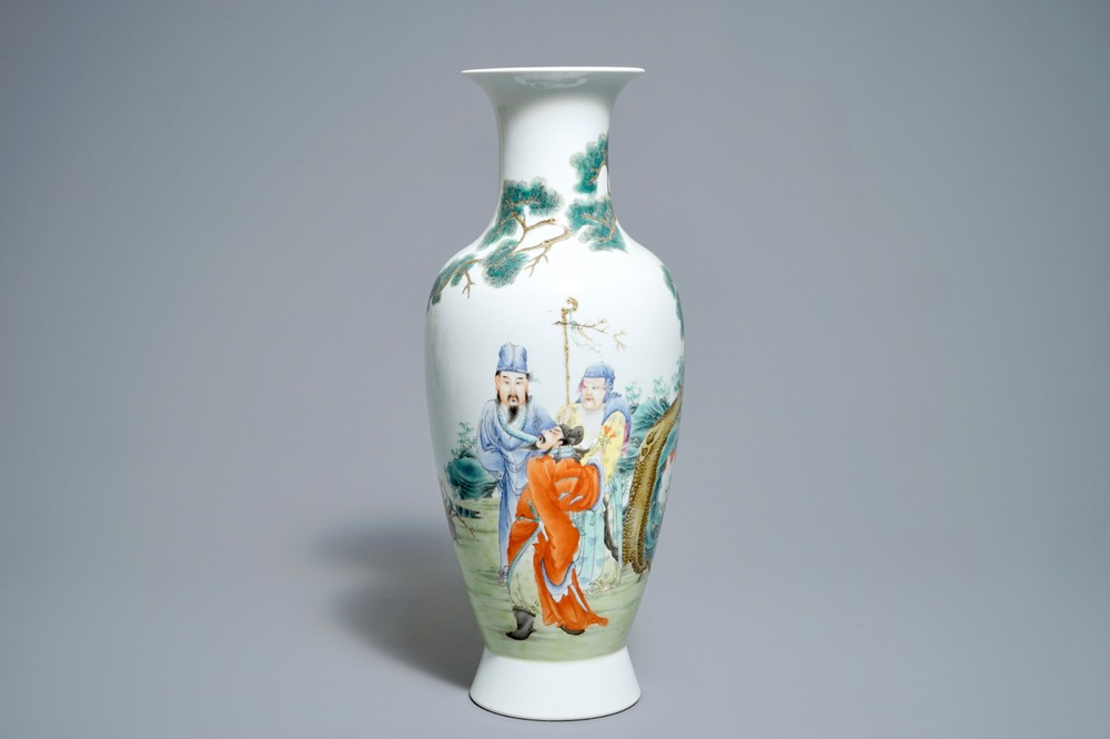 A Chinese famille rose vase with figures in a garden, Hongxian mark, 20th C.