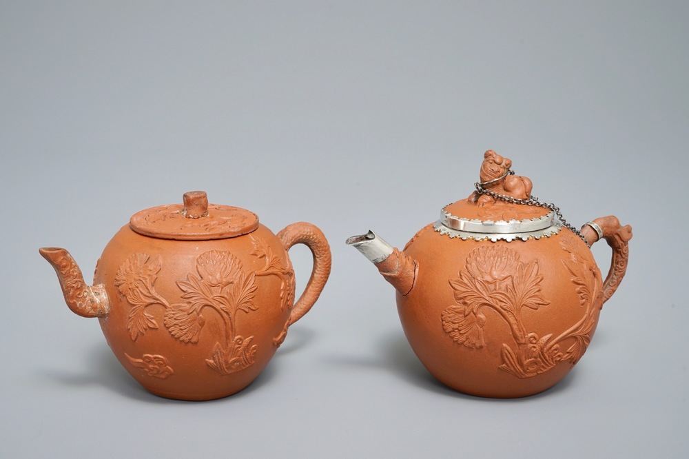 Two Chinese Yixing stoneware teapots with applied floral design, Kangxi