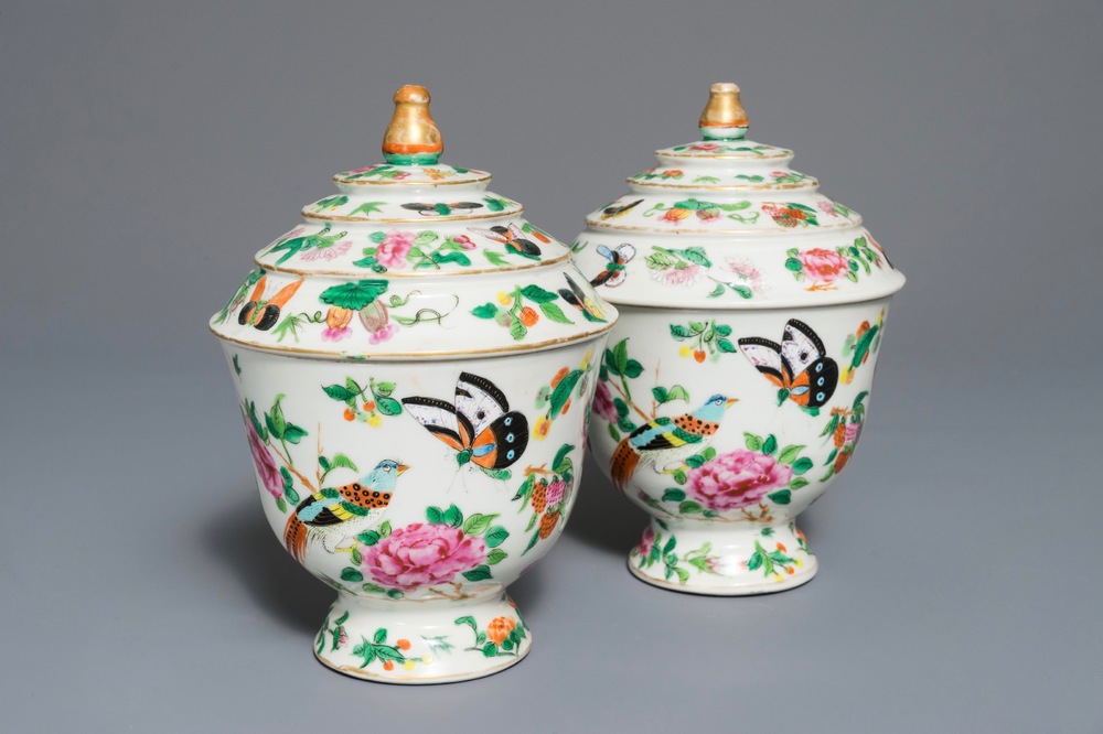 A pair of Chinese Canton famille rose covered bowls, 19th C.