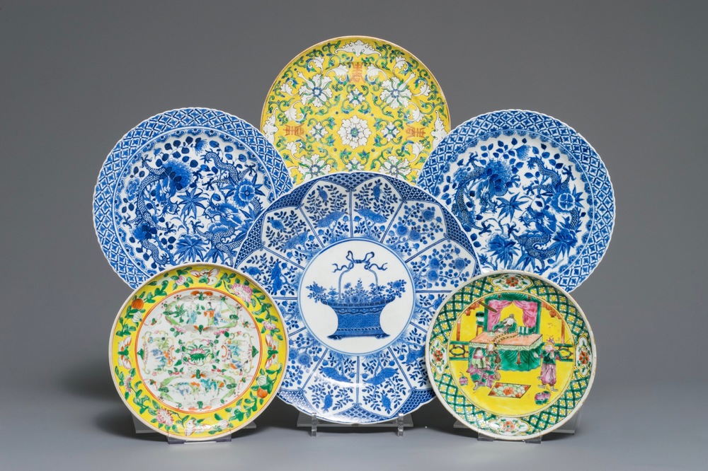Six Chinese blue and white and famille jaune plates, 19th C.
