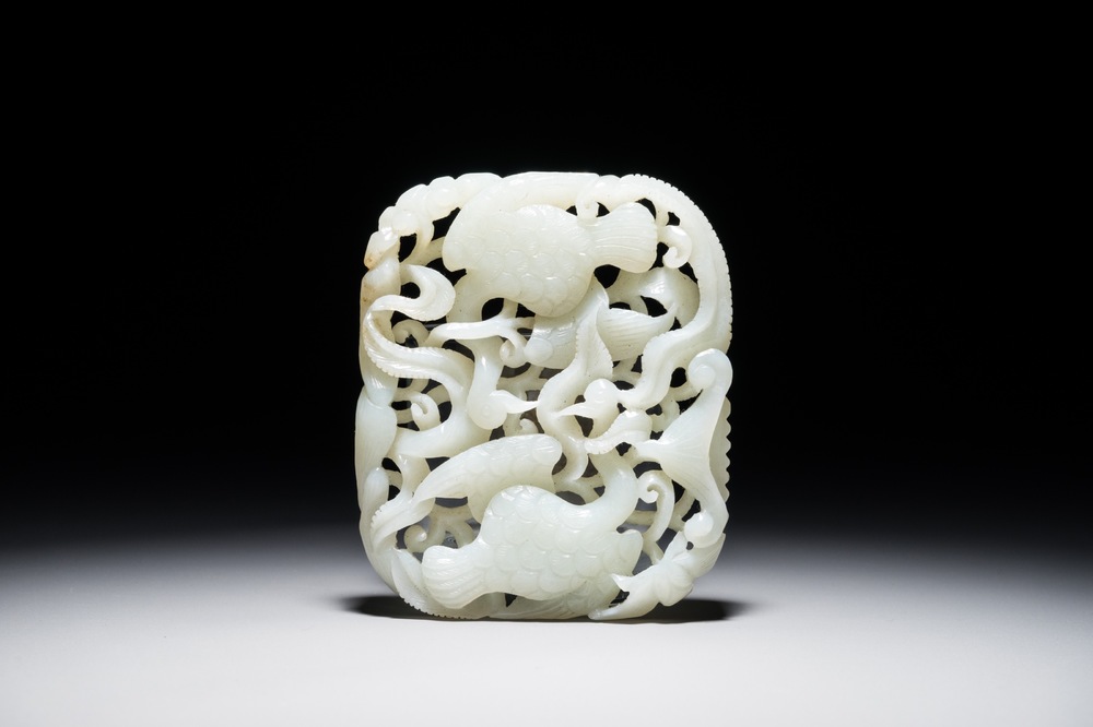 A Chinese reticulated jade plaque with geese and lotus flowers, 19/20th C.