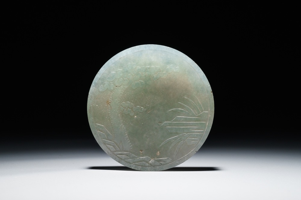 A Chinese green jade belt buckle, 19/20th C.