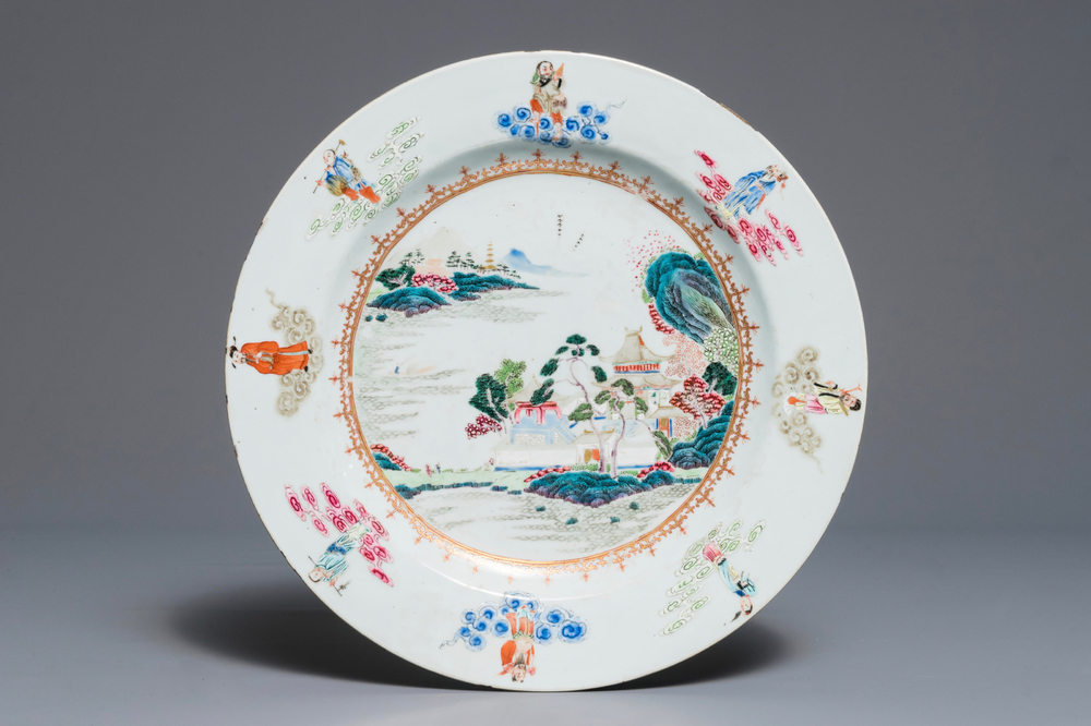 A Chinese famille rose "Eight Immortals" charger with a central landscape, Qianlong