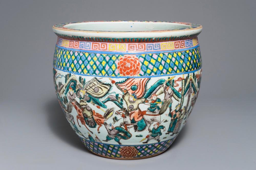 A Chinese famille verte fish bowl with warriors, 19th C.