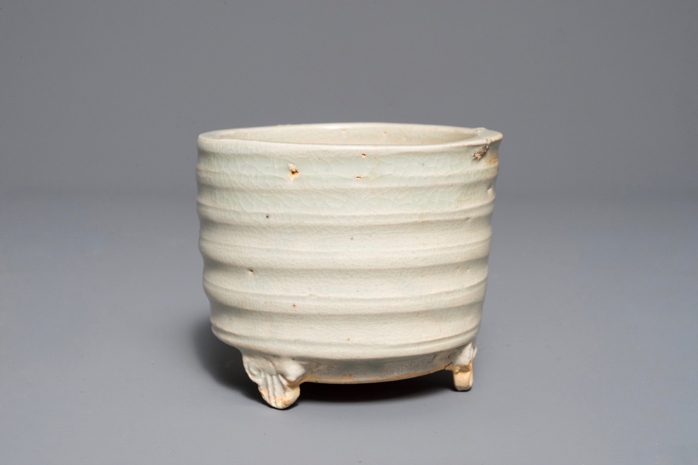A Chinese cylindrical qingbai tripod incense burner, Song or Yuan