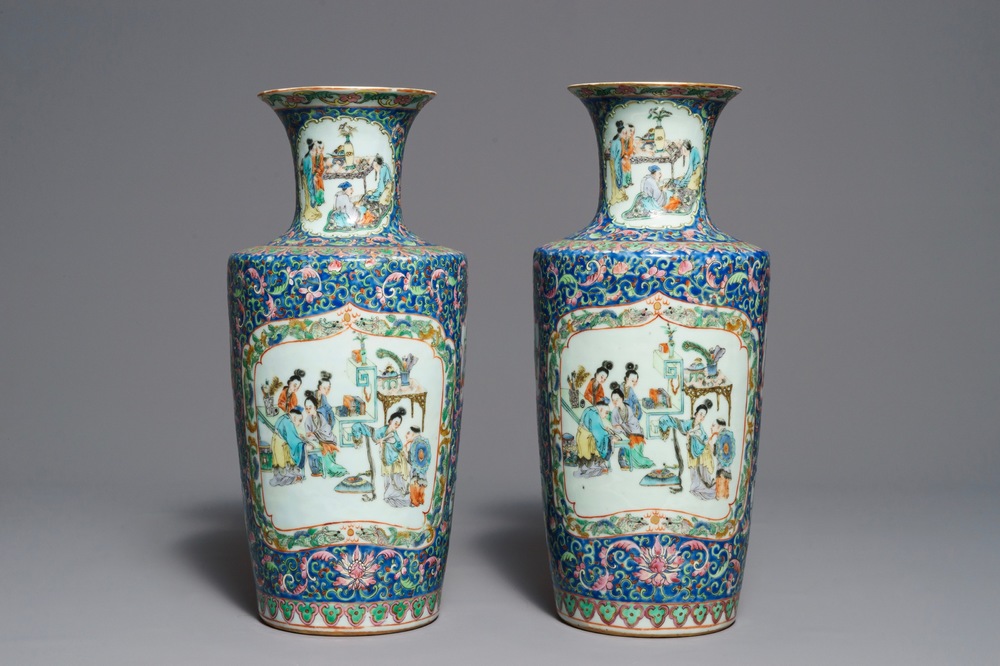 A pair of Chinese famille rose rouleau vases, 19th C.