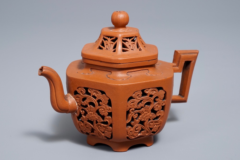 A Chinese reticulated double-walled Yixing stoneware teapot and cover, Kangxi