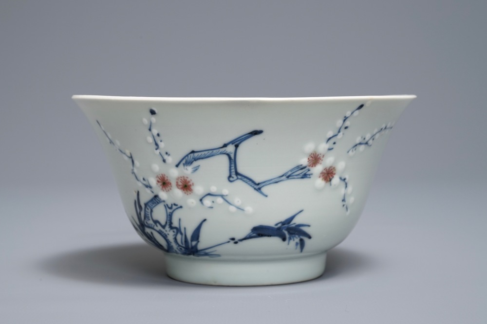 A Chinese blue, white and red on celadon ground 'prunus' bowl, Kangxi