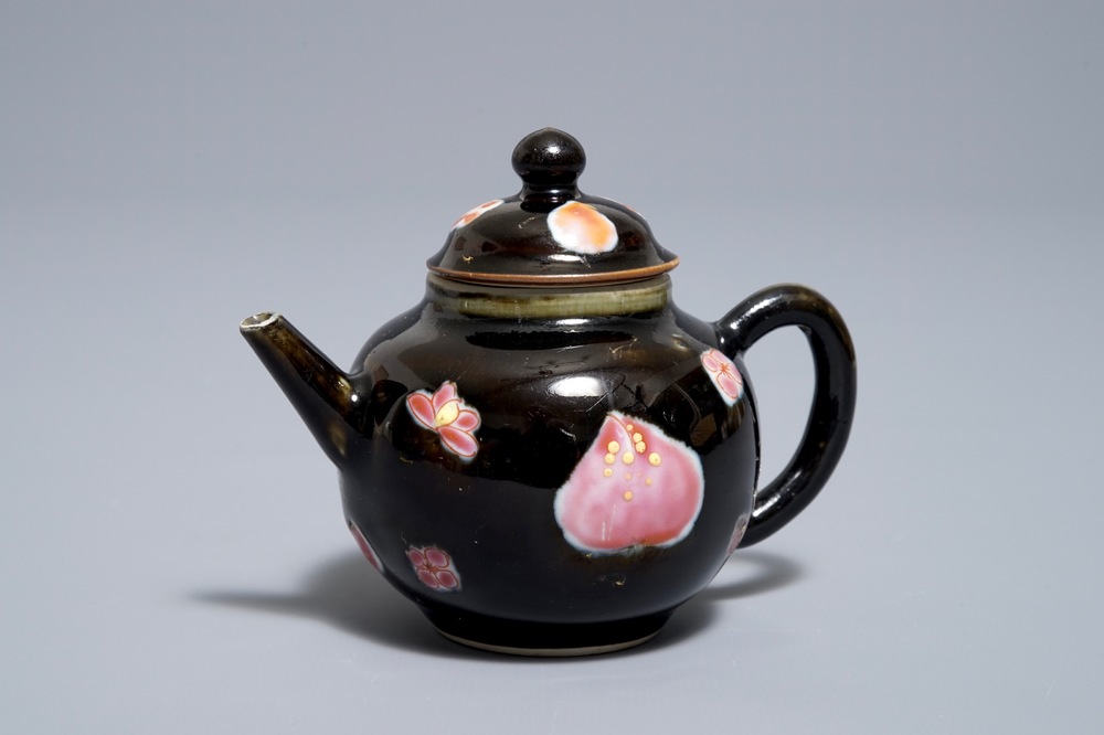 A small Chinese famille rose black ground teapot and cover, Yongzheng/Qianlong